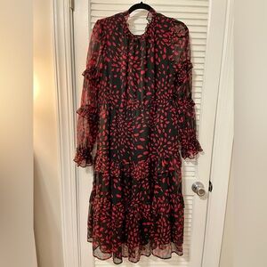Long black with red spotted dress. Sheer sleeves. Never worn. Tag-less